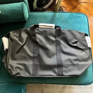 Rains Matte Black Weekend Duffel Bag